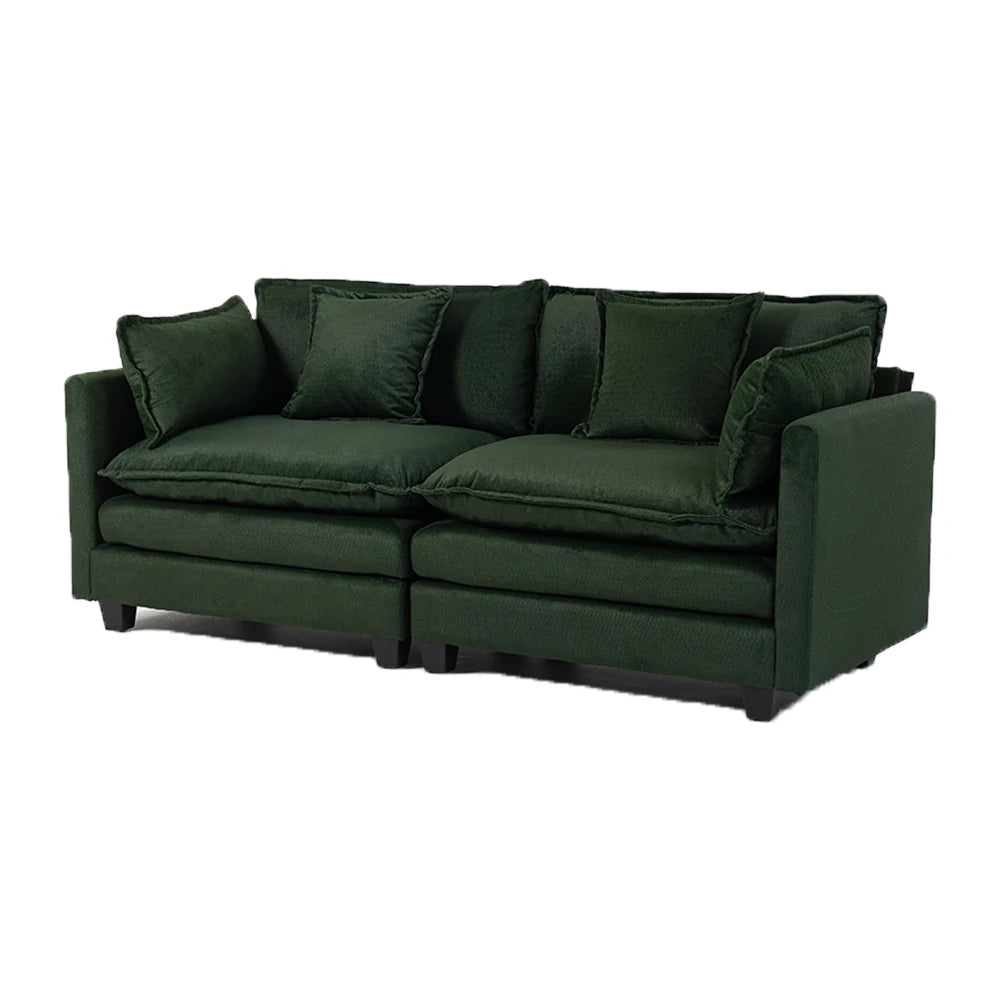 Angle view of deep seat green couch sofa