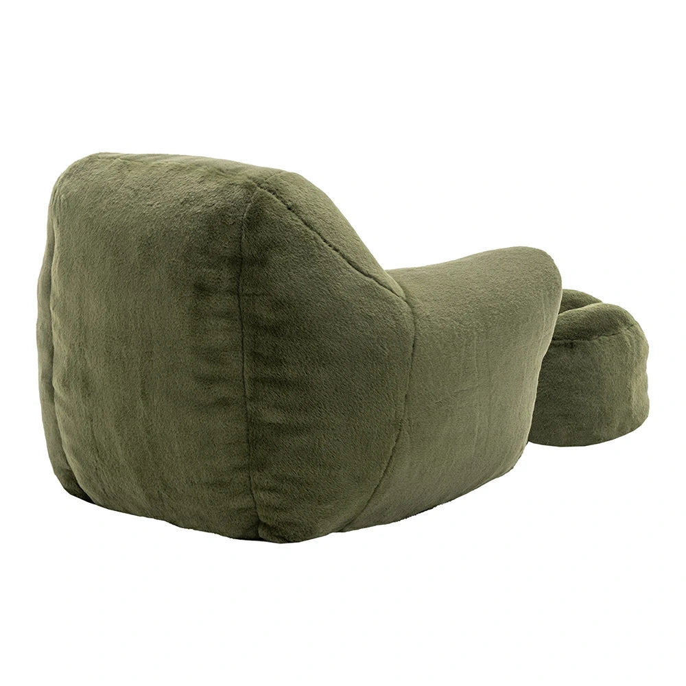 Back view of plush green armchair with ottoman