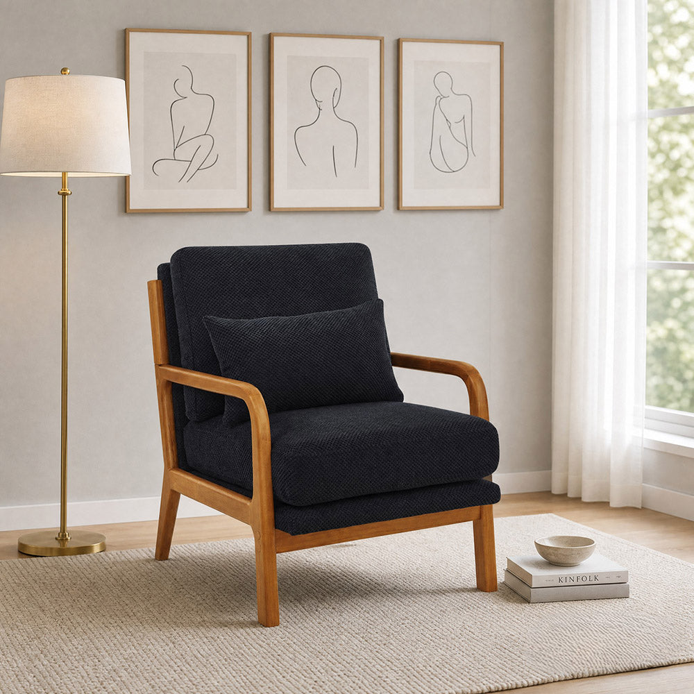 Black mid-century modern accent chair with solid wood frame