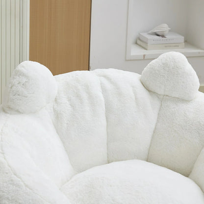 Close-up of plush cat ears backrest on white faux fur bean bag chair