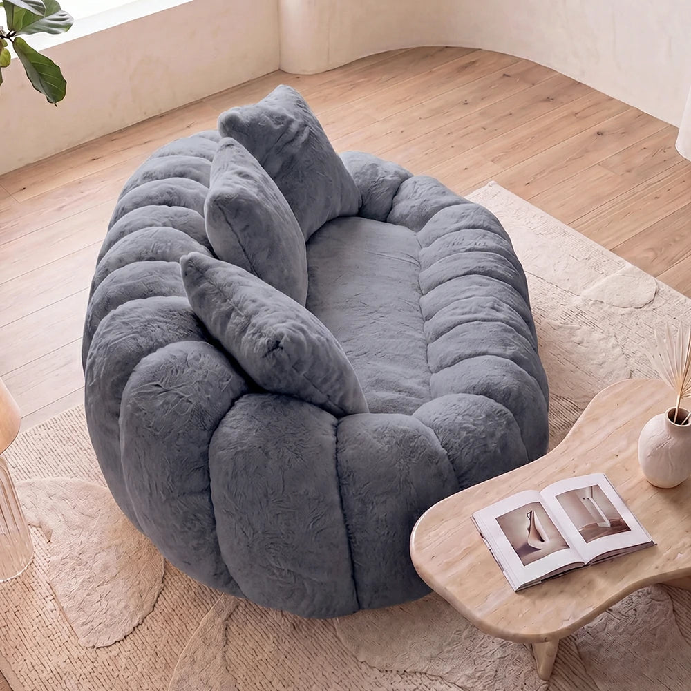 High angle view of grey plush loveseat sofa