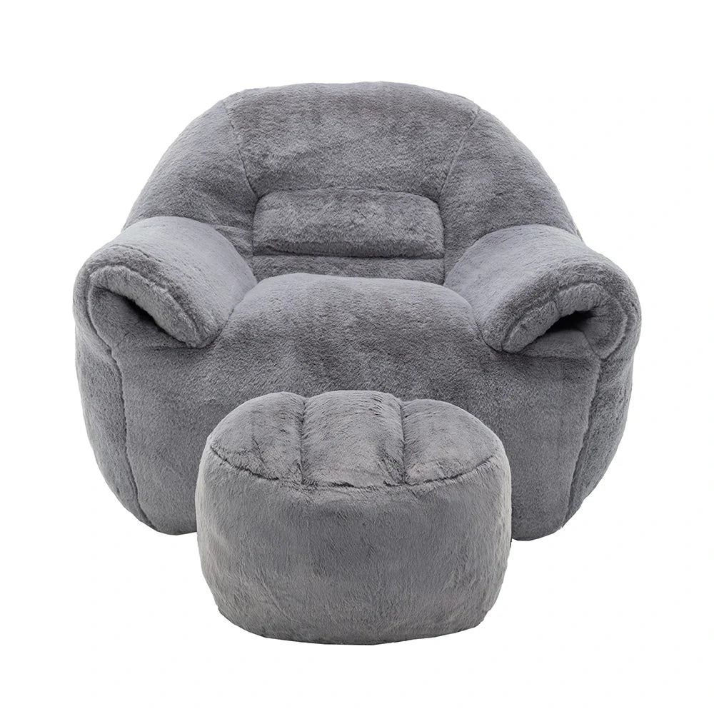 Plush grey armchair and matching ottoman front view