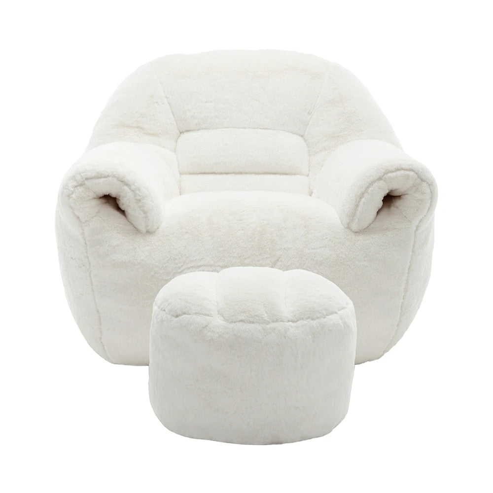 Plush white armchair and matching ottoman front view