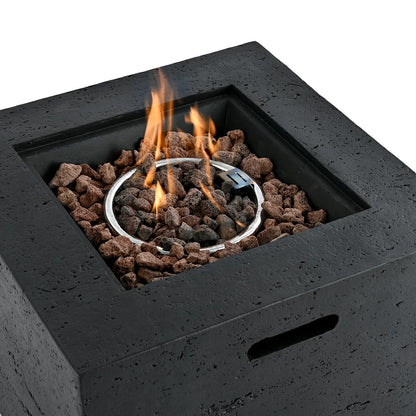 Real flame burning over lava rocks in square outdoor fire pit table