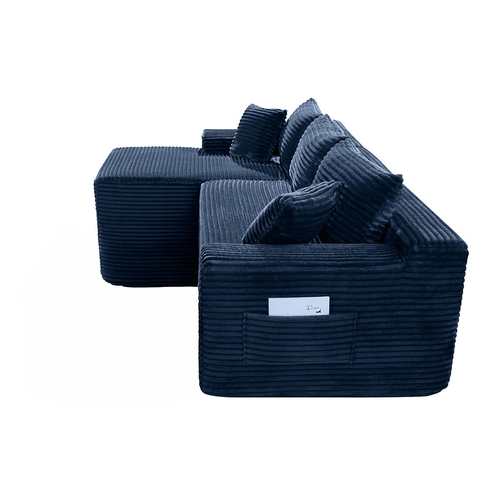 Side view of blue corduroy sofa showing storage pocket