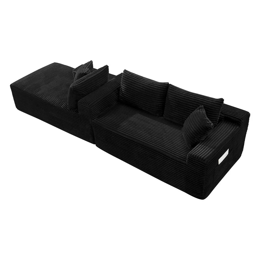 Side view of modular black corduroy sectional sofa