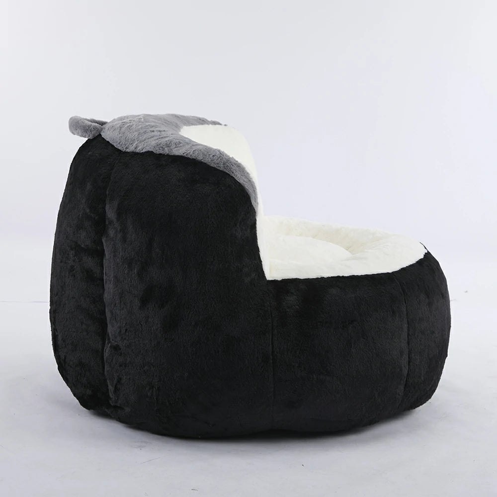 Side view of plush black bean bag armchair
