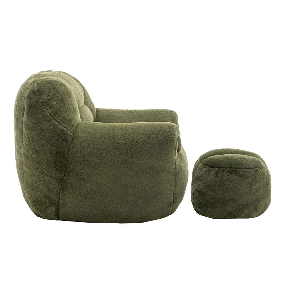 Side view of plush green armchair with ottoman