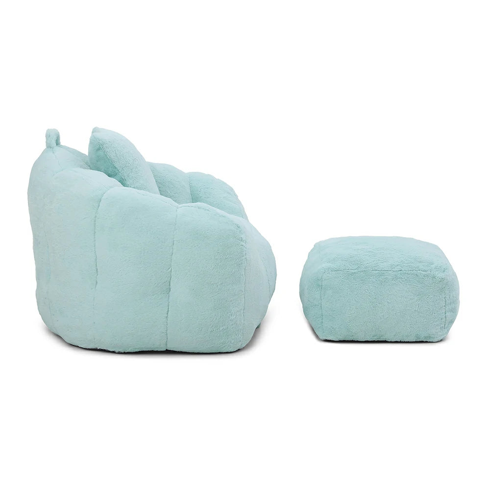 Side view of plush light blue shell bean bag chair and footstool