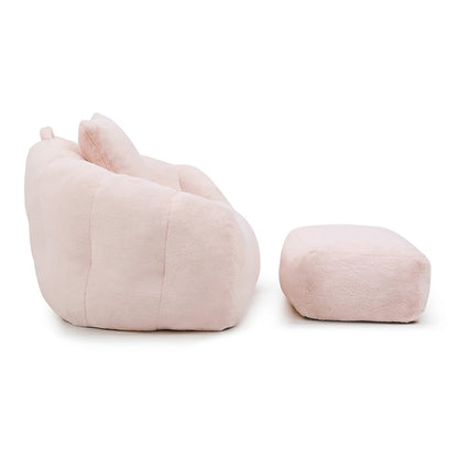 Side view of plush pink shell shaped bean bag chair and ottoman