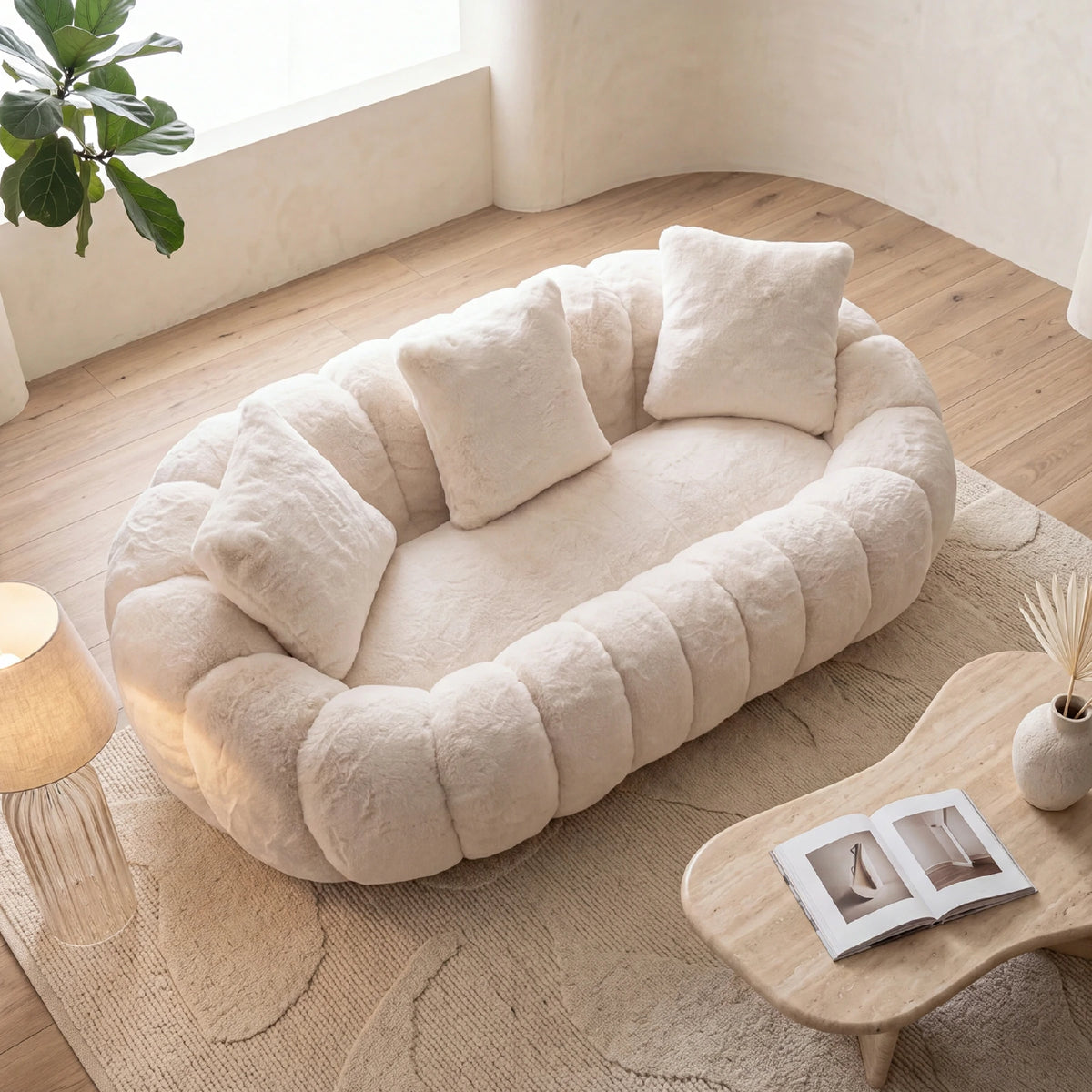 Top angle view of beige plush faux fur loveseat sofa