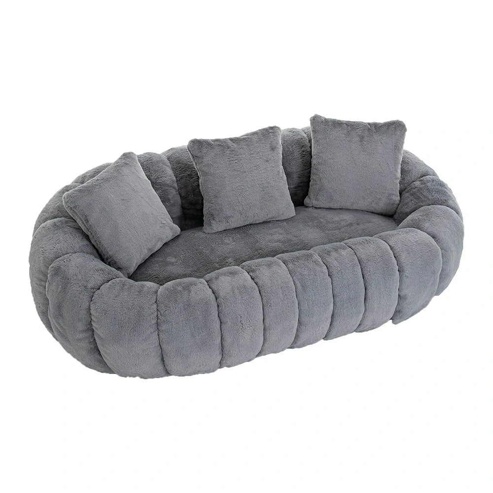 Top angle view of grey plush faux fur loveseat sofa