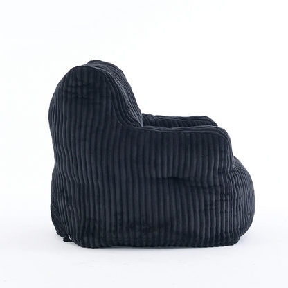 side view black ribbed corduroy lounge chair 1