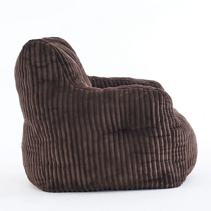 side view brown ribbed corduroy lounge chair